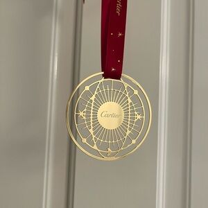 Cartier Gold Ornament with Red Cartier Ribbon
